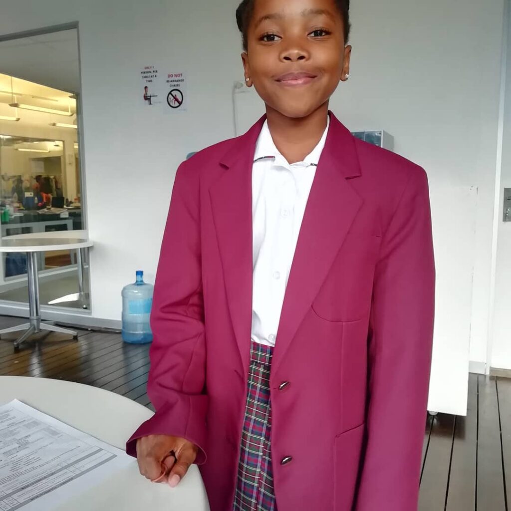 Lizwi wearing her school uniform on Durban Gen as Lwandle 