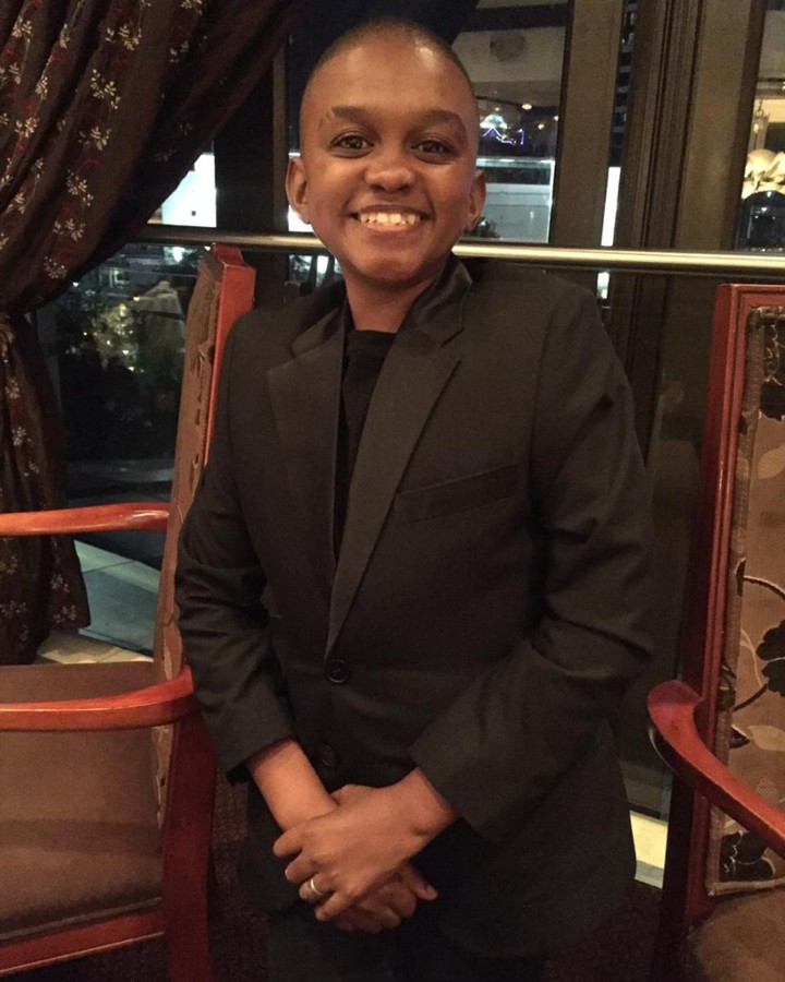 Themba Ntuli smiles wearing formal. He acted as Pule in Rhythm City.