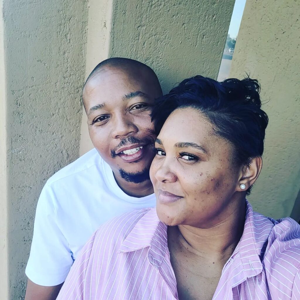 Image of Presley Chweneyagae known for Tsotsi with his wife.