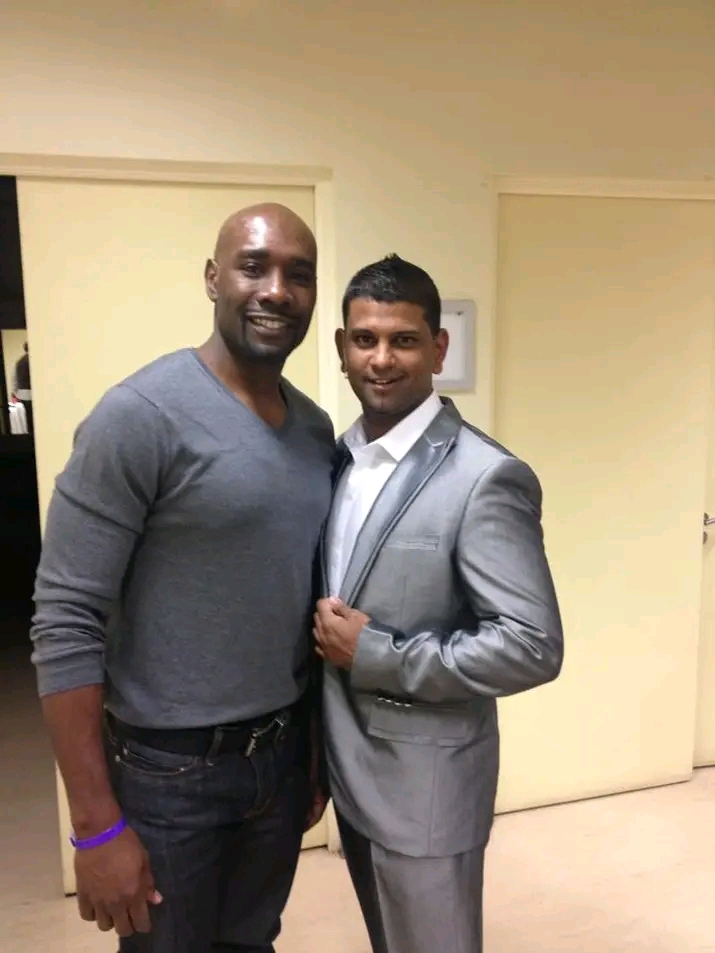 Image of Sans Moonsamy with a fellow actor Morris Chestnut.
