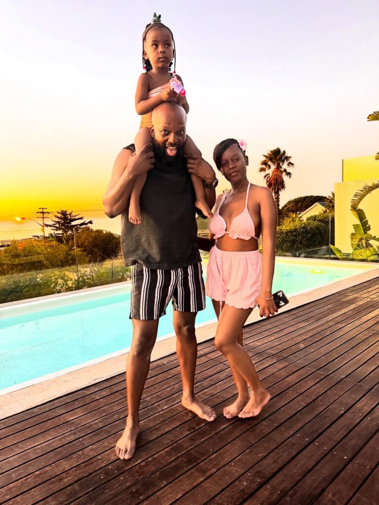 Clement Mathela with his wife and children.