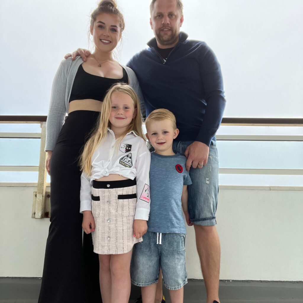 Natalie Furk with her husband James Furk and their children