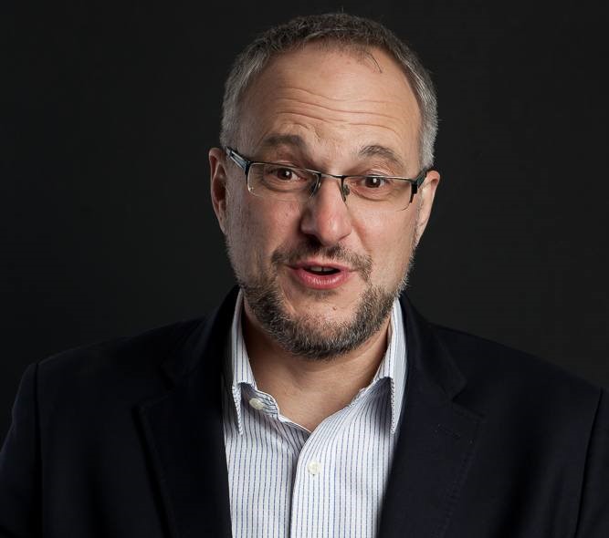 Stephen Grootes is a prominent South African political journalist, broadcaster, and author with over 20 years of experience in the media industry.