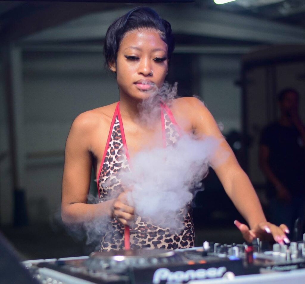 Kganya Mashitwa Malefo Known as Queencess Kganya doing DJing Work.